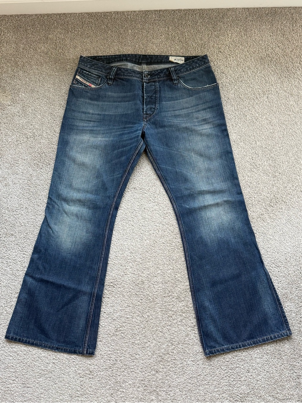 Men's Diesel ZAF flare leg jeans size 34x32, 10.5 inch leg opening.